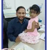 Dr. Adarsh Mishra smiling - lead audiologist at Varanasi Digital Hearing Aid & Speech Therapy Center